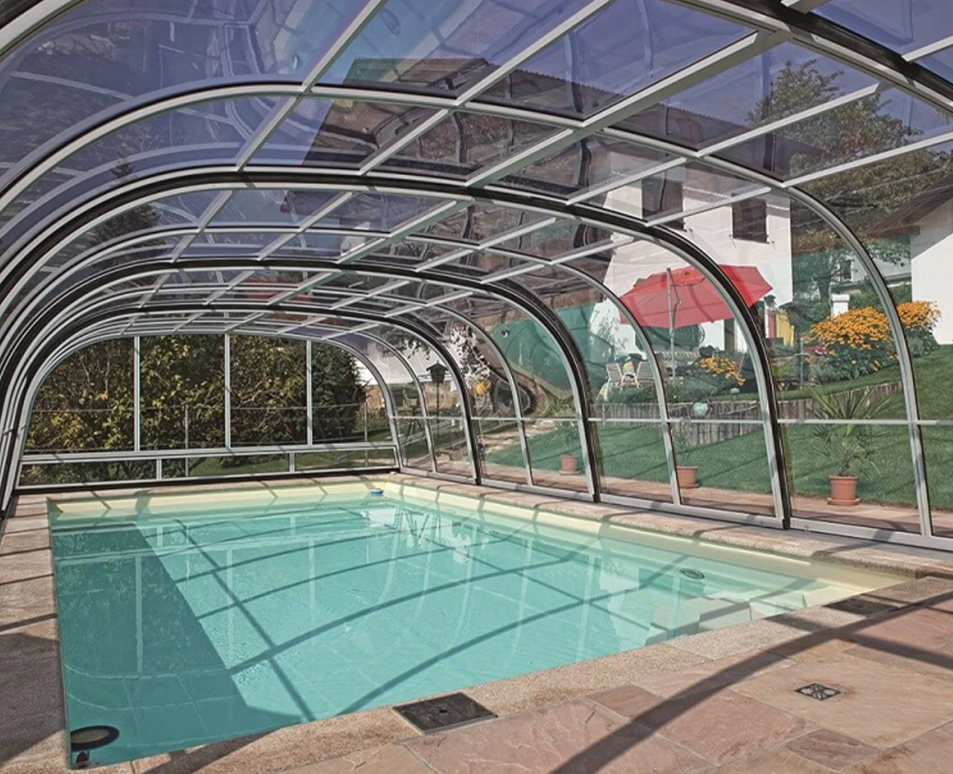 Telescopic swimming pool enclosure with sliding sections