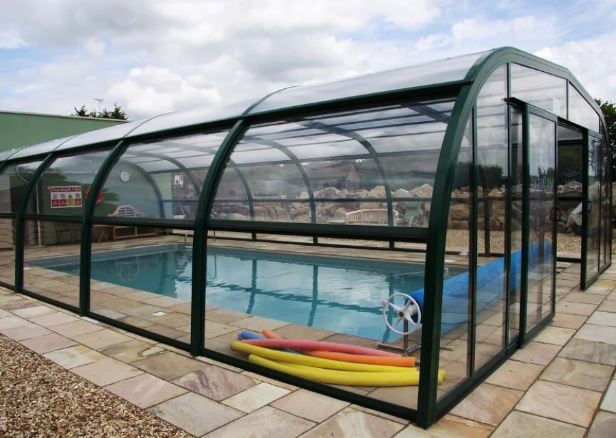 The Endless Summer pool enclosure with open sliding side sections